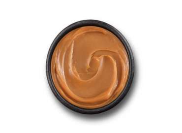 Dulce de leche en frasco de 250gr, ideal para untar o usar en recetas.